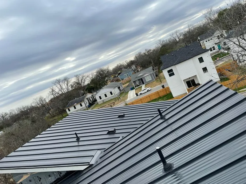 Standing seam metal roof panels with vents for Skylight Repair in New Lenox